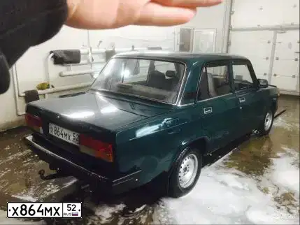 Фото автомобиля LADA 2107 LADA, 2006 — госномер А256МТ30. Цвет: Темно-зеленый