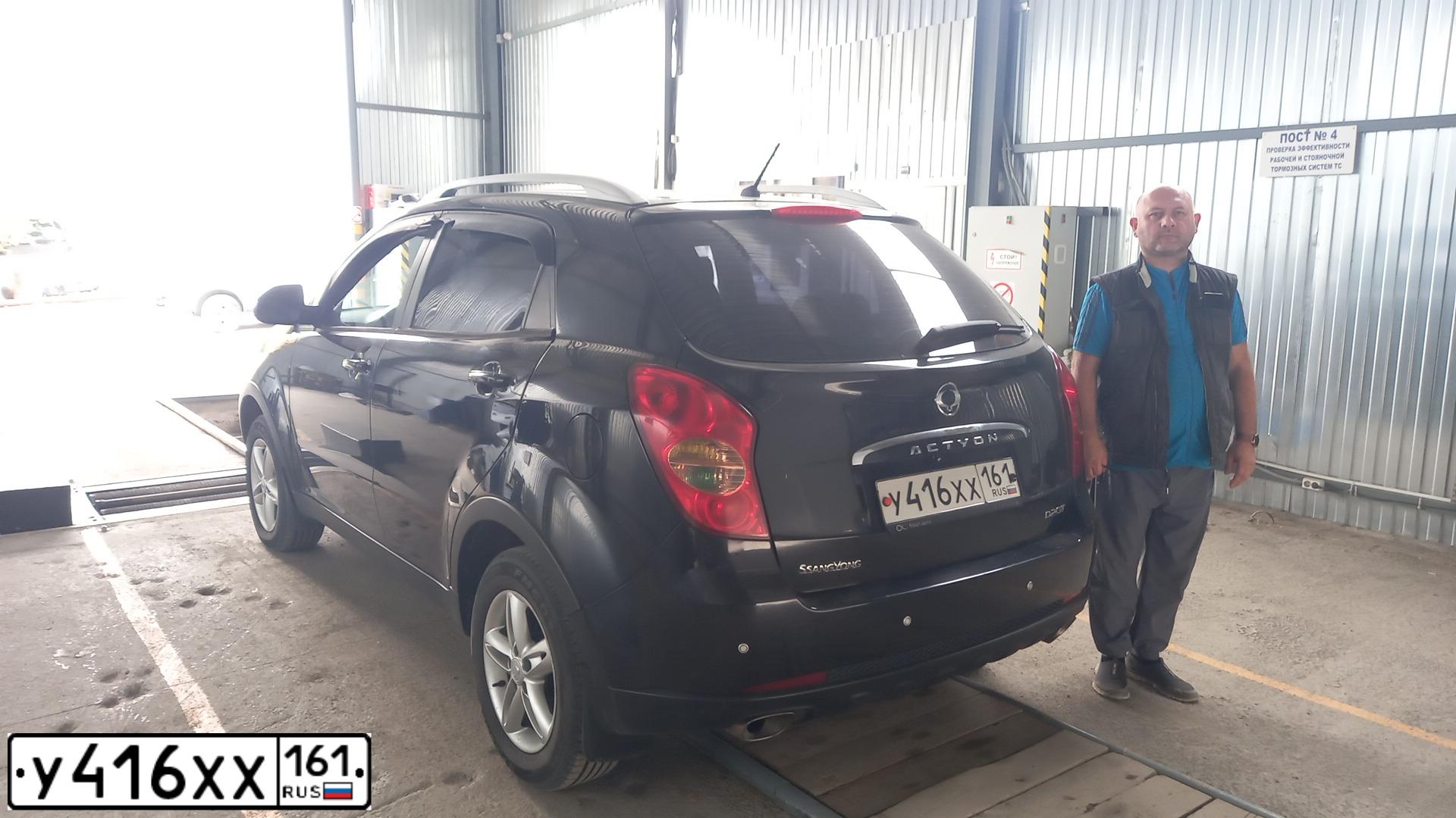 Фото автомобиля SSANGYONG ACTYON, 2011 — госномер Р997ТЕ161. Цвет: ЧЕРНЫЙ