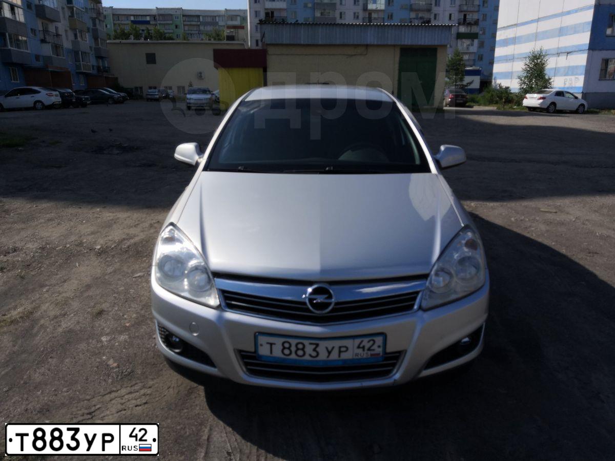 Фото автомобиля OPEL ASTRA, 2011 — госномер М469НР142. Цвет: Серебристый