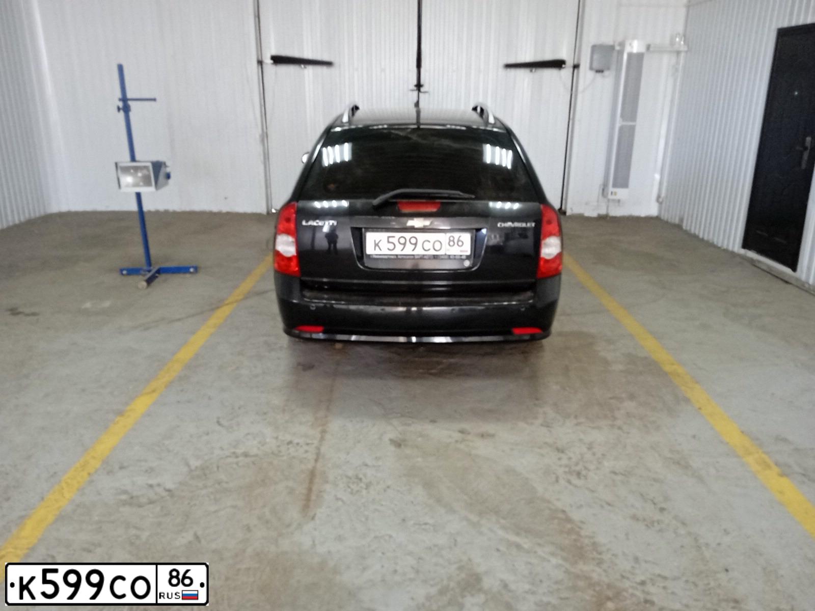 Фото автомобиля CHEVROLET LACETTI, 2008 — госномер К599СО86. Цвет: ЧЕРНЫЙ