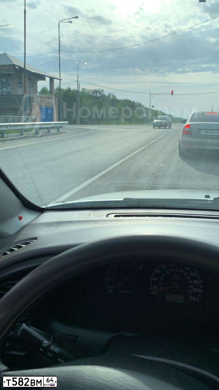 Фото автомобиля SKODA OCTAVIA, 2013 — госномер Т582ВМ64. Цвет: БЕЖЕВЫЙ