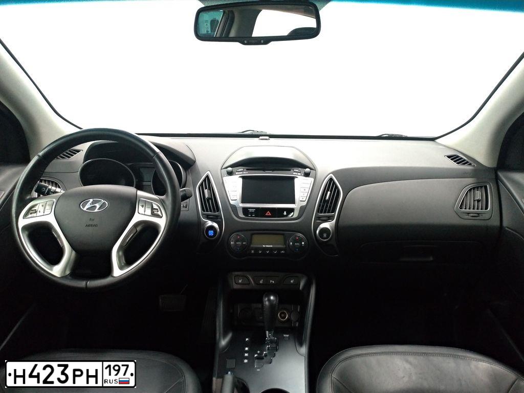Фото автомобиля HYUNDAI IX35, 2011 — госномер Н423РН197. Цвет: Коричневый