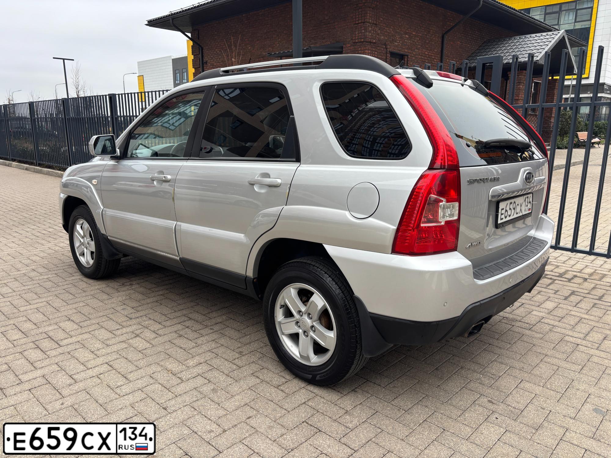 Фото автомобиля KIA SPORTAGE, 2009 — госномер Е659СХ134. Цвет: ПЕРЛ-СЕРЕБРИСТЫЙ