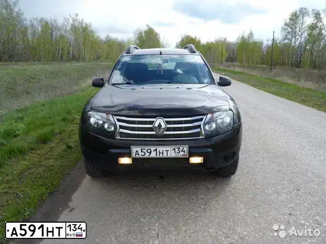 Фото автомобиля RENAULT DUSTER, 2014 — госномер А591НТ134. Цвет: ТЕМНО КОРИЧНЕВЫЙ