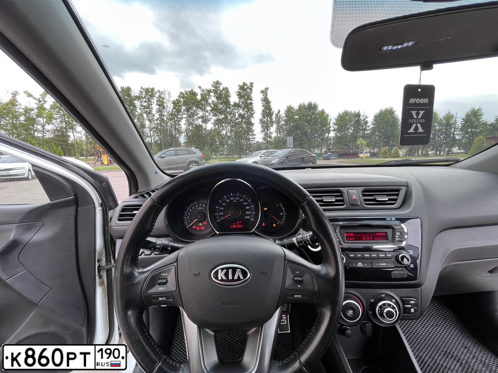 Фото автомобиля KIA RIO, 2012 — госномер А904МВ57. Цвет: Белый