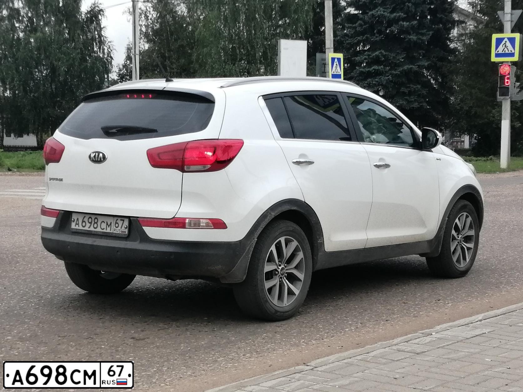 Фото автомобиля KIA SPORTAGE, 2015 — госномер А862РР777. Цвет: ЧЕРНЫЙ ПЕРЛАМУТР