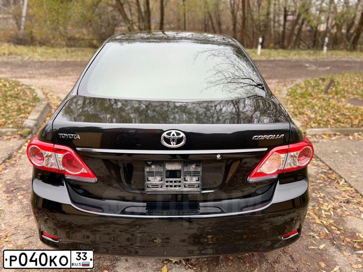 Фото автомобиля TOYOTA COROLLA, 2011 — госномер Т718ОУ790. Цвет: ЧЕРНЫЙ
