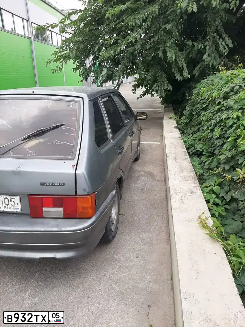 Фото автомобиля ВАЗ 21140, 2005 — госномер Р744КЕ198. Цвет: ЧЕРНЫЙ