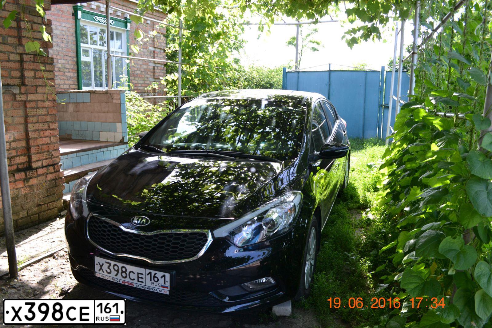 Фото автомобиля KIA CERATO, 2014 — госномер Х398СЕ161. Цвет: ЧЕРНЫЙ