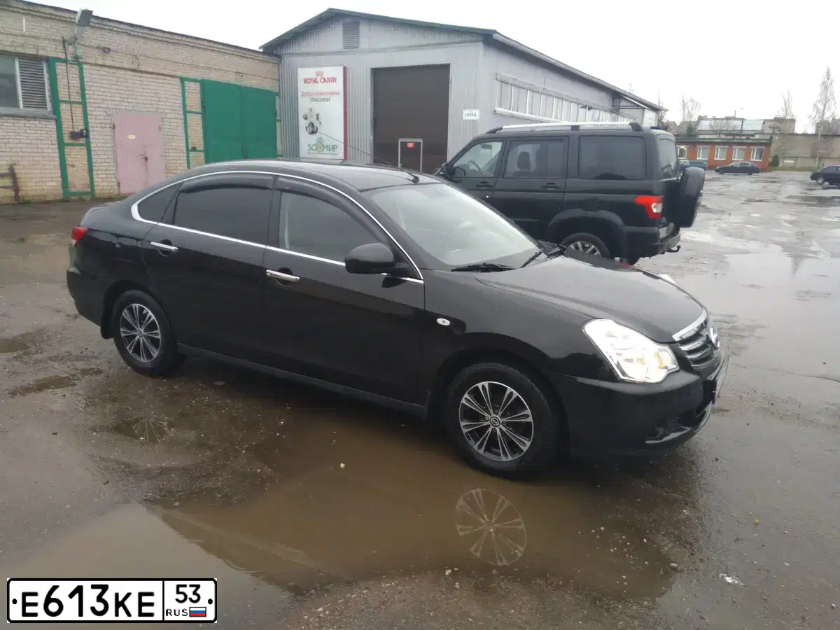 Фото автомобиля NISSAN ALMERA /AVTOVAZ/, 2016 — госномер О085УТ47. Цвет: ЧЕРНЫЙ