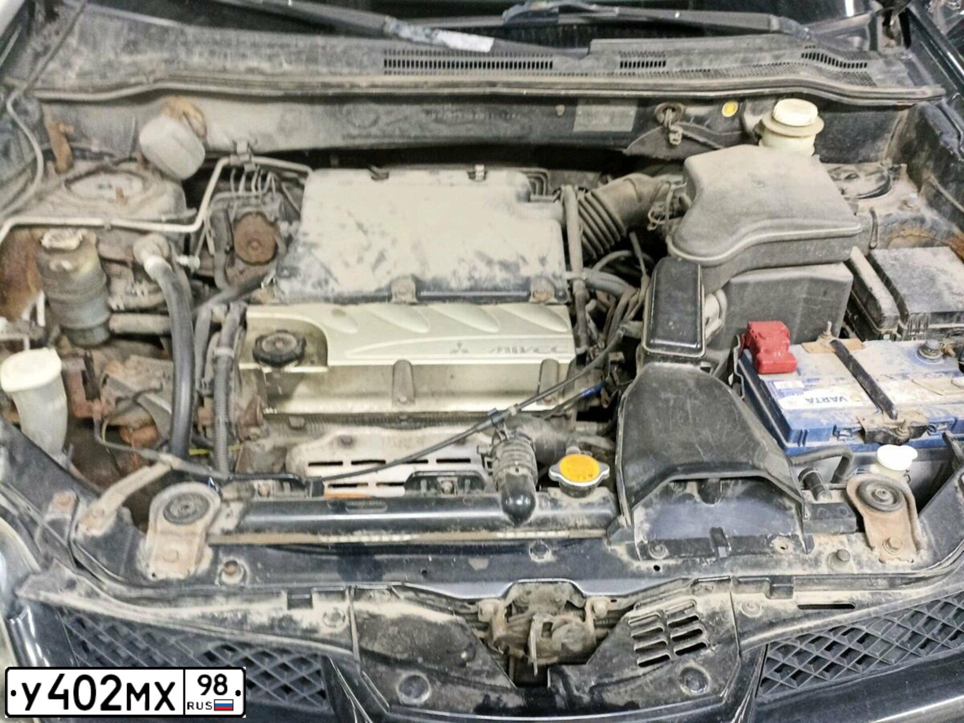 Фото автомобиля MITSUBISHI OUTLANDER, 2004 — госномер О600ХА196. Цвет: ЧЕРНЫЙ