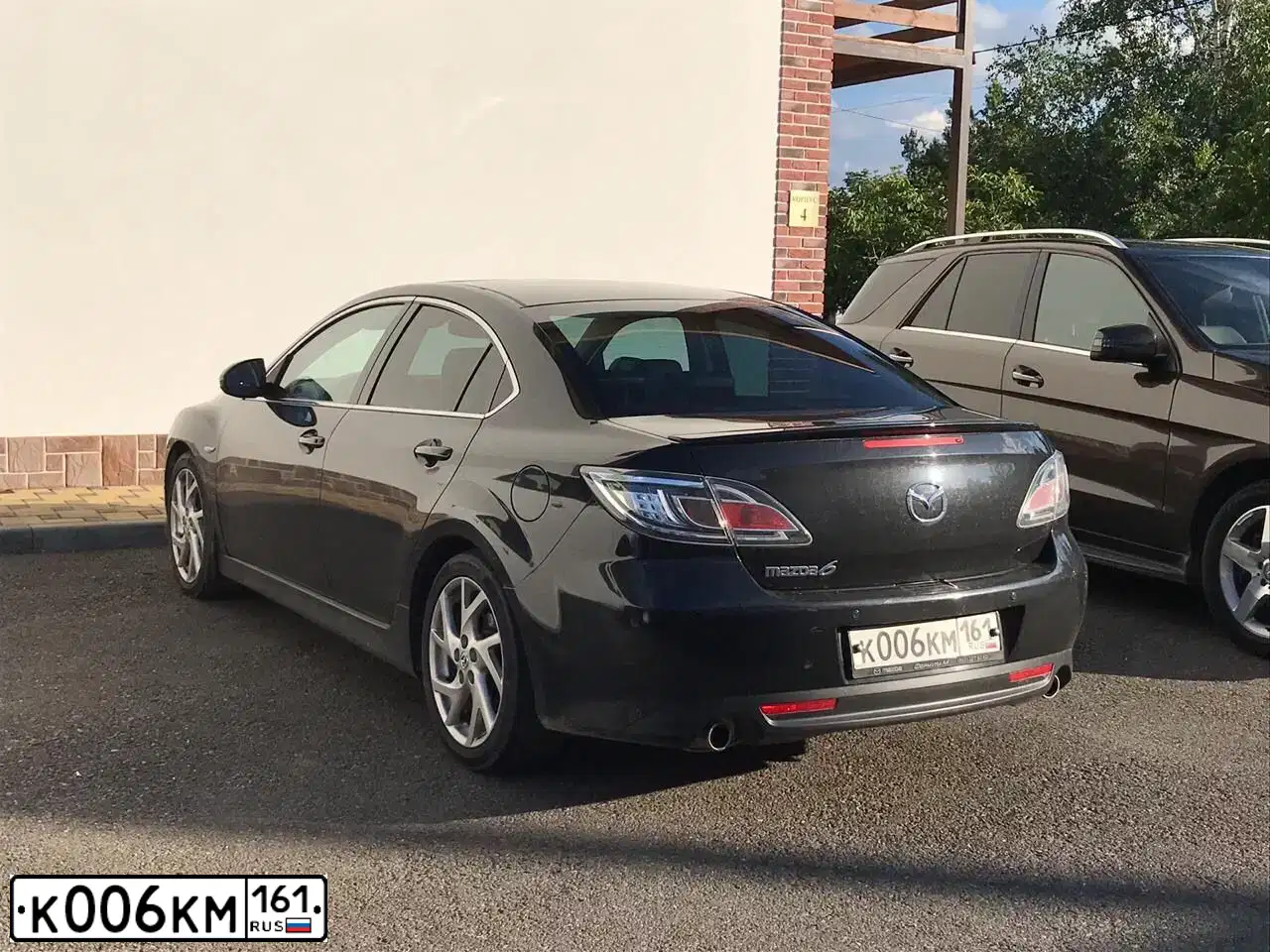 Фото автомобиля MAZDA 6, 2009 — госномер К006КМ161. Цвет: ЧЕРНЫЙ