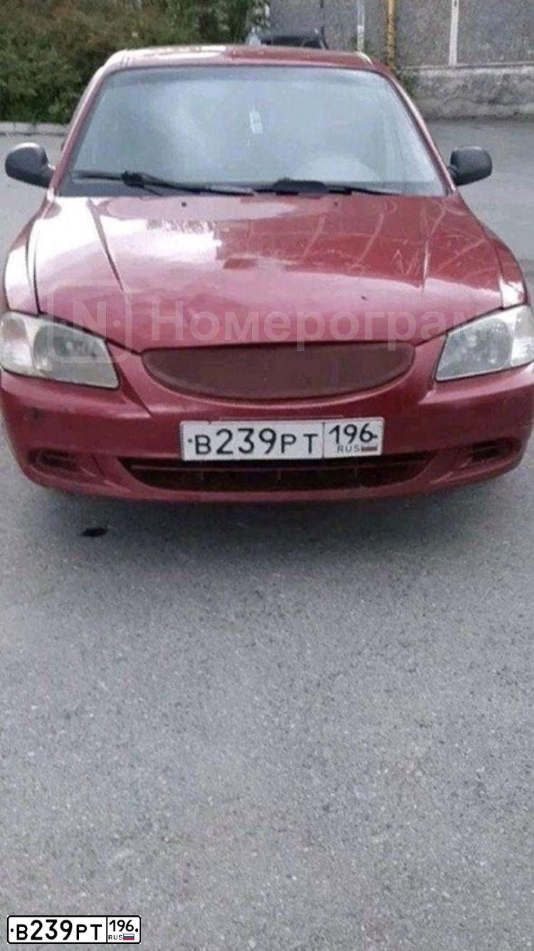 Фото автомобиля TAGAZ ACCENT, 2005 — госномер М719НА196. Цвет: Красный