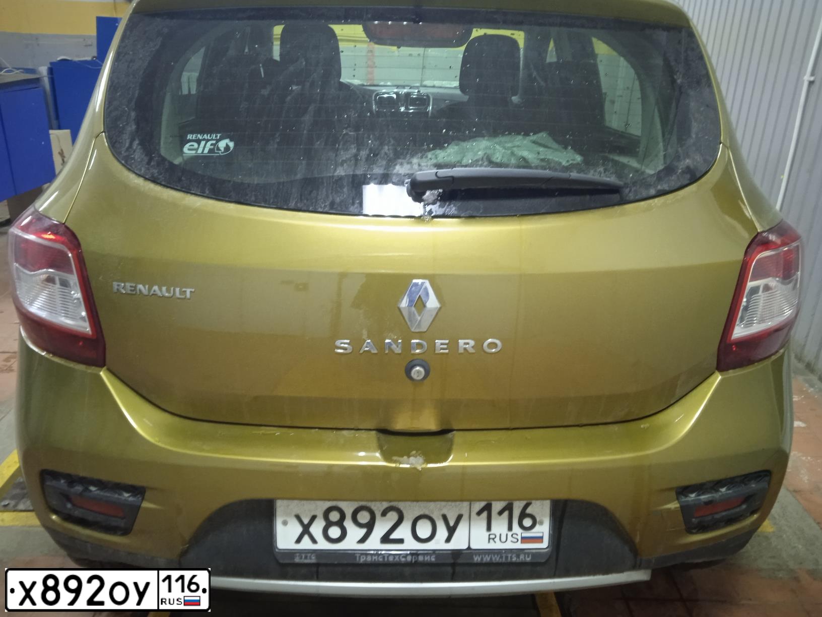 Фото автомобиля RENAULT SANDERO, 2016 — госномер Х892ОУ116. Цвет: ЗОЛОТИСТО-ЗЕЛЕНЫЙ