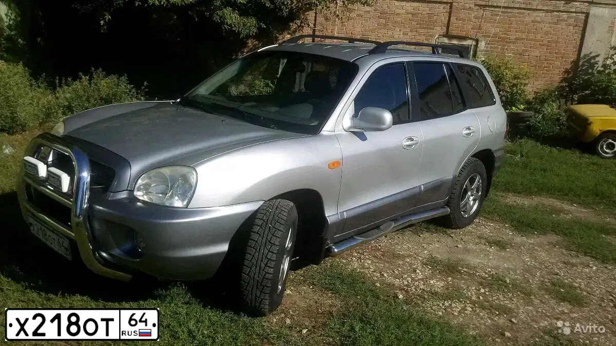 Фото автомобиля ХЕНДЭ САНТА ФЕ 2.7 GLS 4WD AUTO, 2002 — госномер К587ХС164. Цвет: БЕЛЫЙ (СЕРЕБРИСТЫЙ)