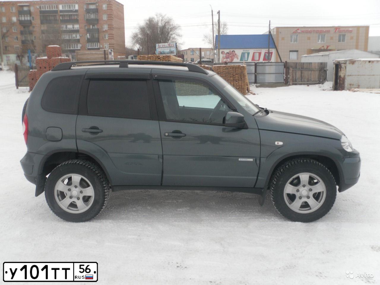 Фото автомобиля CHEVROLET NIVA, 2012 — госномер У101ТТ56. Цвет: Темный Серо-Зеленый Металик
