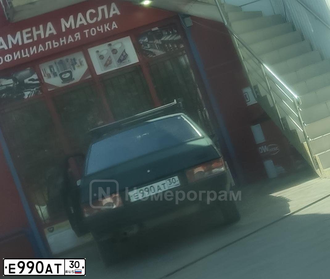 Фото автомобиля LADA 2109 SAMARA, 1999 — госномер Е990АТ30. Цвет: ЗЕЛЕНЫЙ