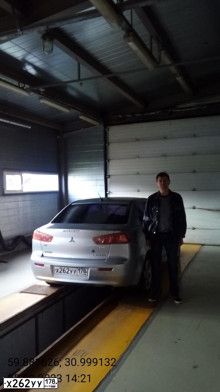 Фото автомобиля MITSUBISHI LANCER, 2008 — госномер К888АС10. Цвет: серебристый