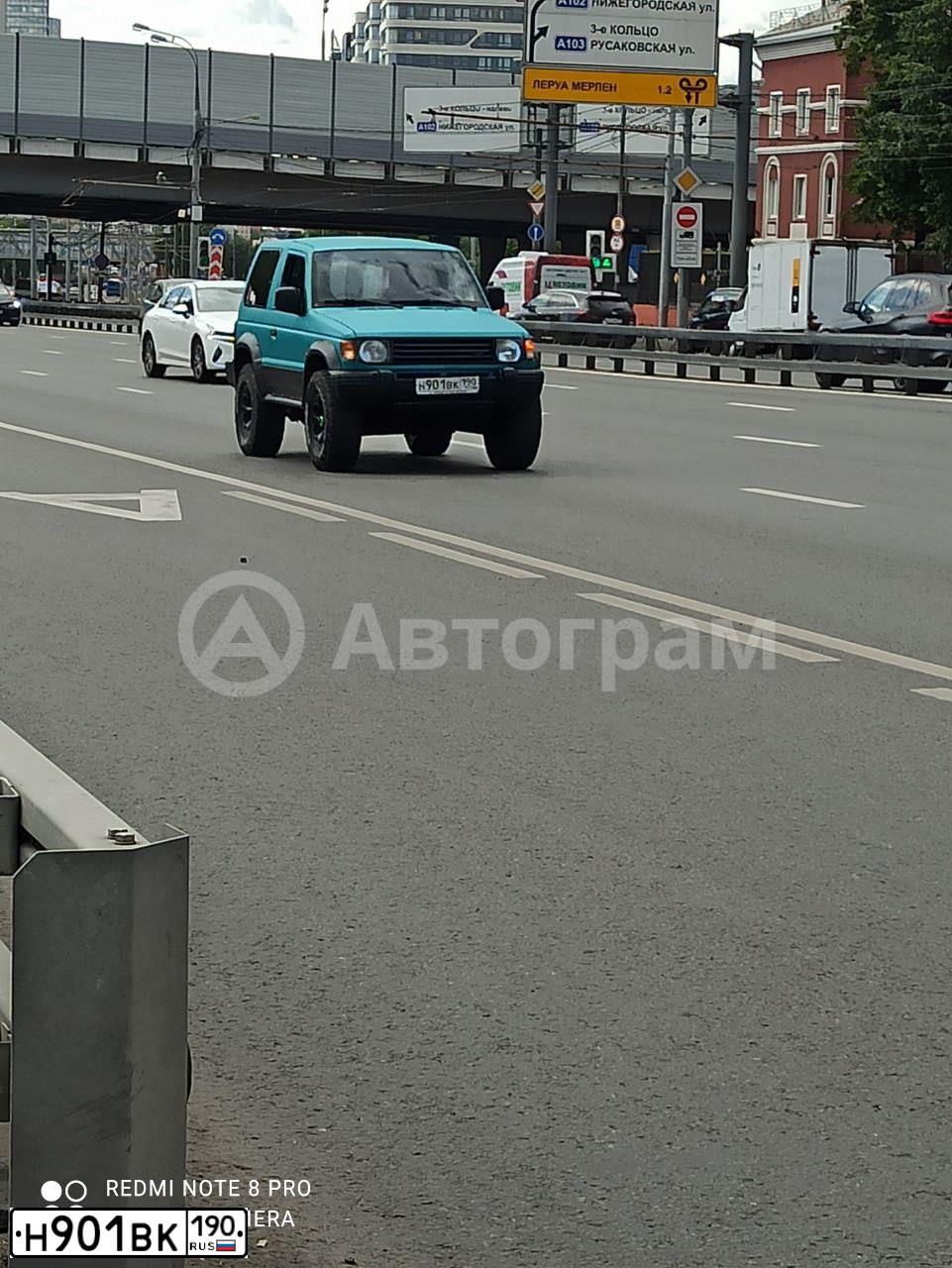Фото автомобиля MITSUBISHI PAJERO, 1993 — госномер М752ЕС186. Цвет: ЗЕЛЕНЫЙ