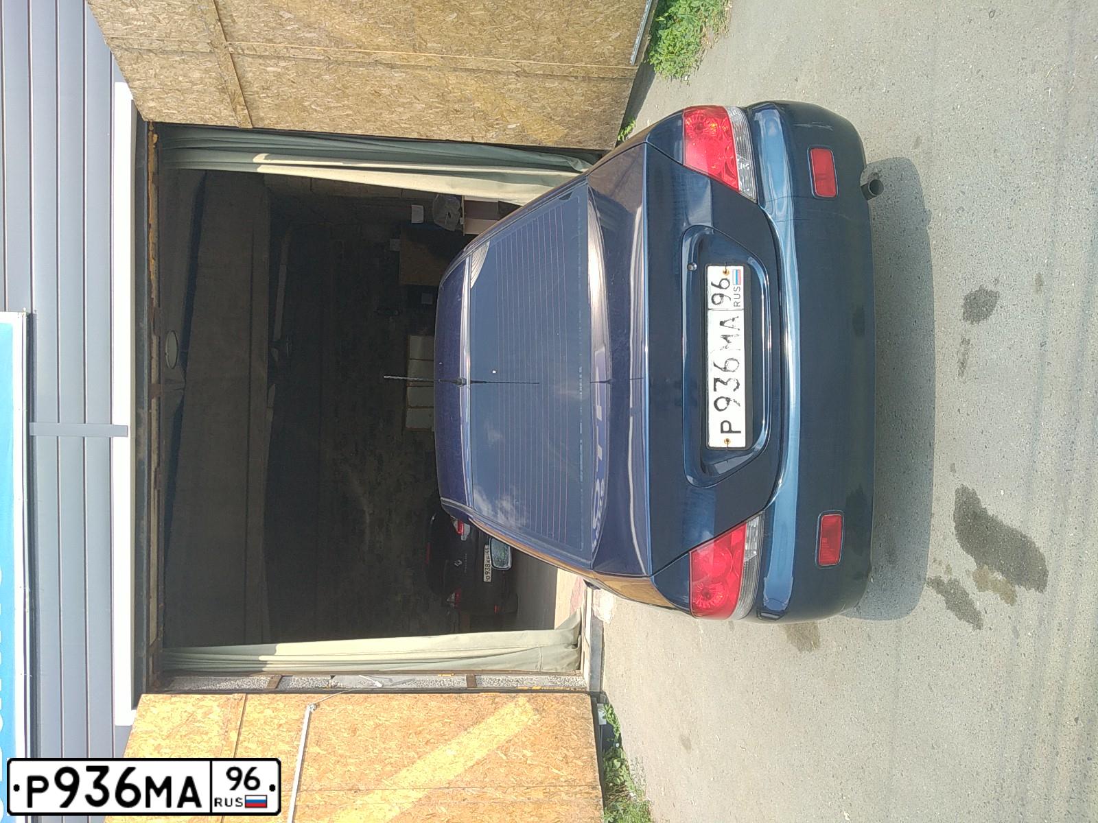 Фото автомобиля MITSUBISHI LANCER, 2004 — госномер Р659НК45. Цвет: синий