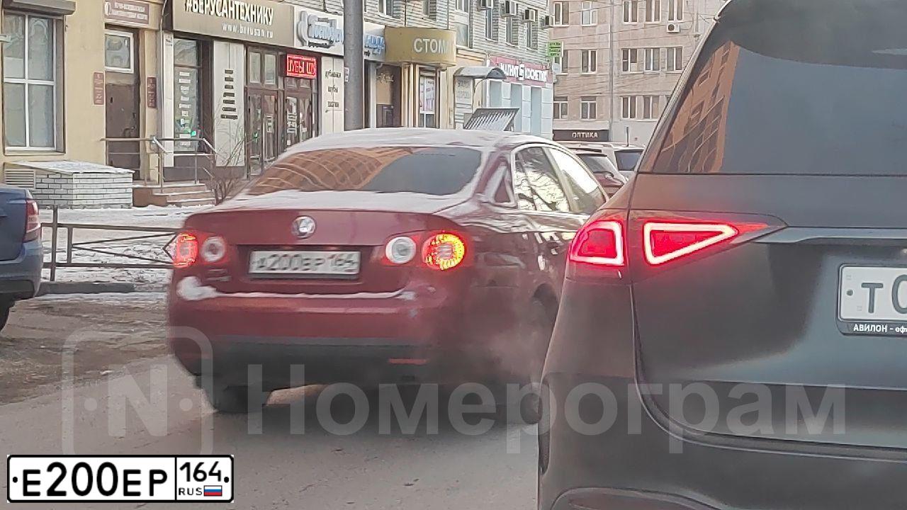 Фото автомобиля RENAULT PREMIUM, 2000 — госномер Е200ЕР164. Цвет: синий