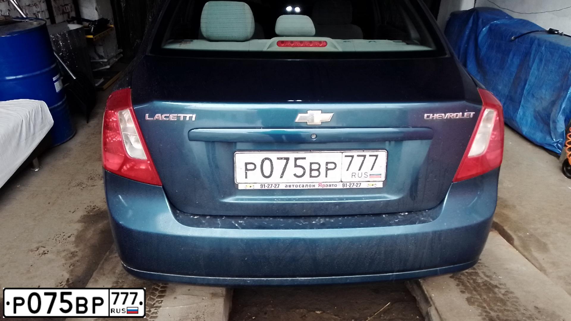 Фото автомобиля CHEVROLET LACETTI, 2008 — госномер Е651СР76. Цвет: синий