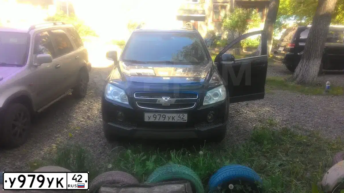 Фото автомобиля CHEVROLET CAPTIVA, 2007 — госномер М356НХ154. Цвет: ЧЕРНЫЙ