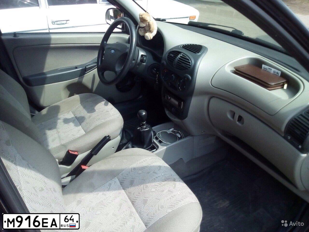 Фото автомобиля LADA 2104, 2001 — госномер М916ЕА64. Цвет: БЕЛЫЙ