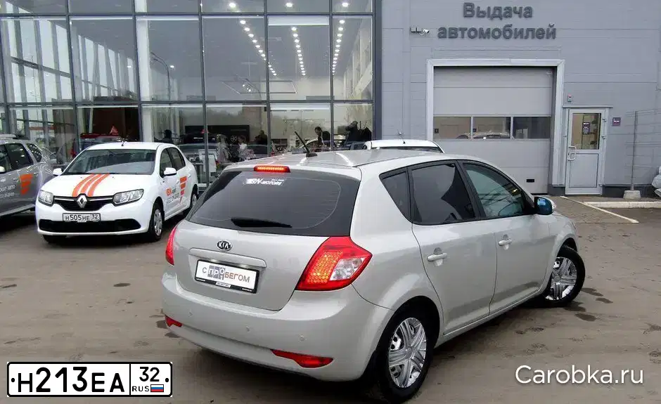Фото автомобиля KIA CEE'D, 2012 — госномер Н213ЕА32. Цвет: Серебристый