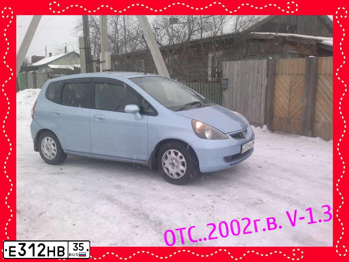 Фото автомобиля KIA RIO, 2014 — госномер Е312НВ35. Цвет: СЕРЫЙ