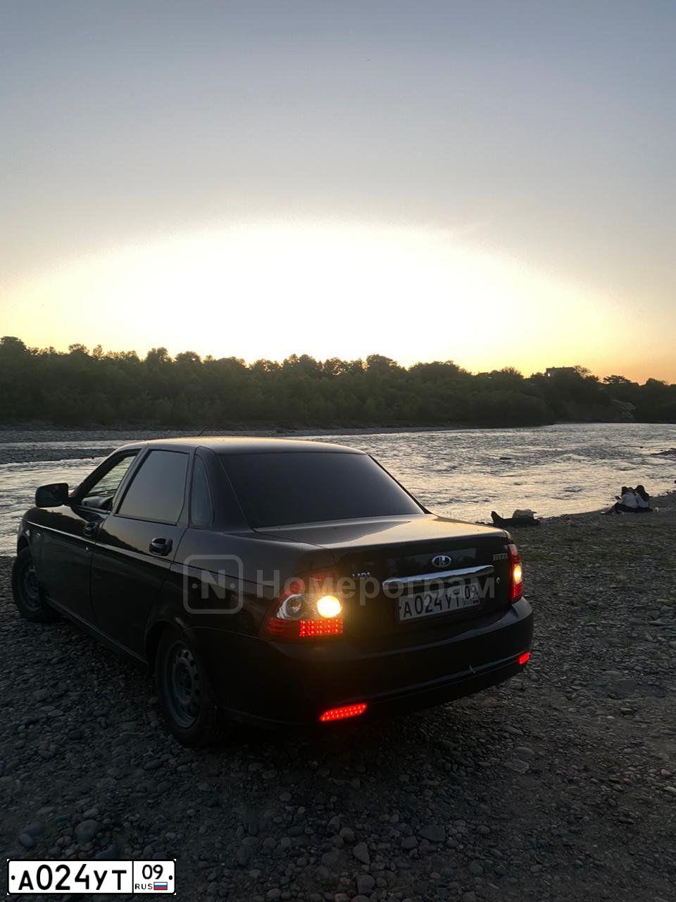 Фото автомобиля LADA 2170 PRIORA, 2011 — госномер А024УТ09. Цвет: СИНЕ-ЧЕРНЫЙ