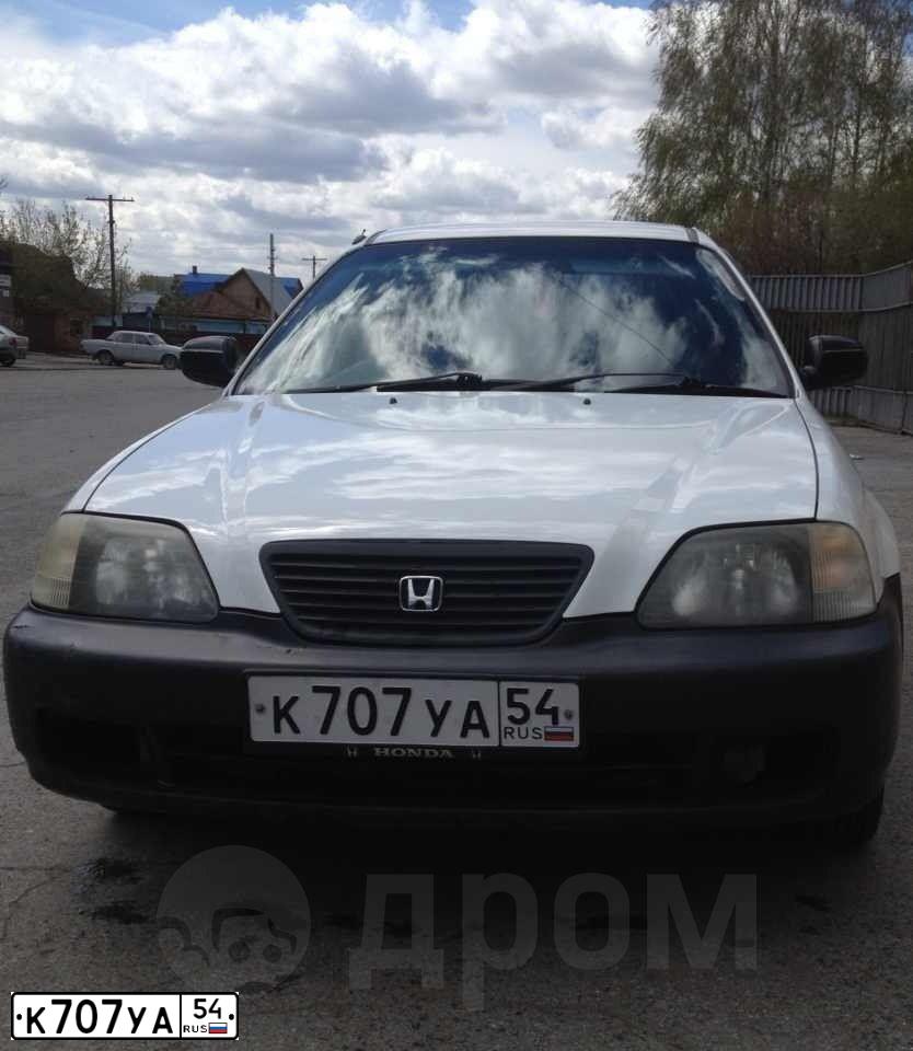Фото автомобиля МАЗДА КАПЕЛЛА, 2001 — госномер В450ОТ122