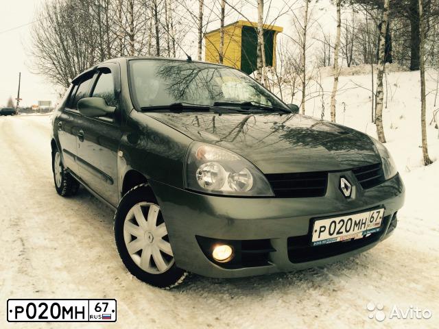 Фото автомобиля RENAULT SYMBOL, 2008 — госномер К081НТ67. Цвет: ТЕМНО-СЕРЫЙ