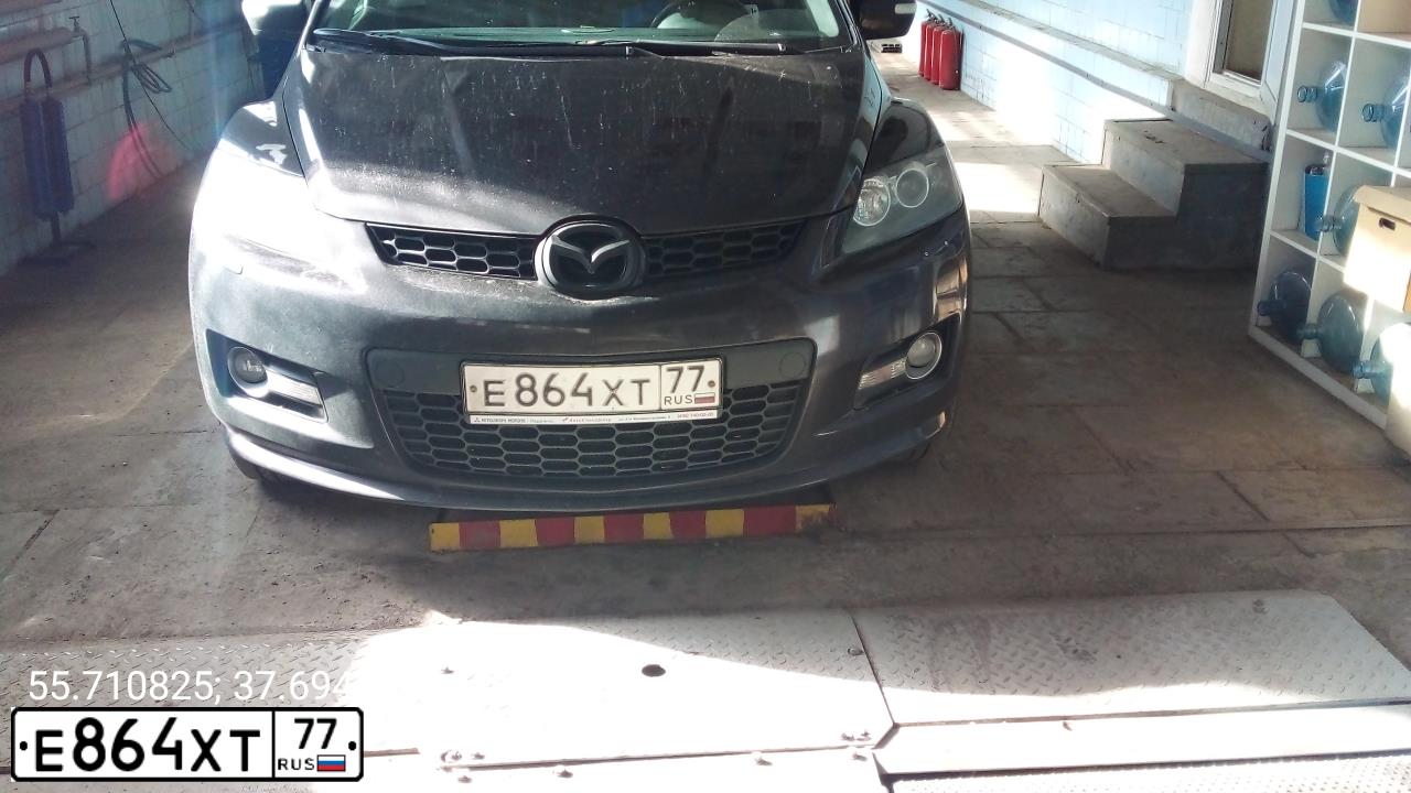 Фото автомобиля MAZDA CX-7, 2008 — госномер Е864ХТ77. Цвет: ВИШНЕВЫЙ ТЕМНЫЙ