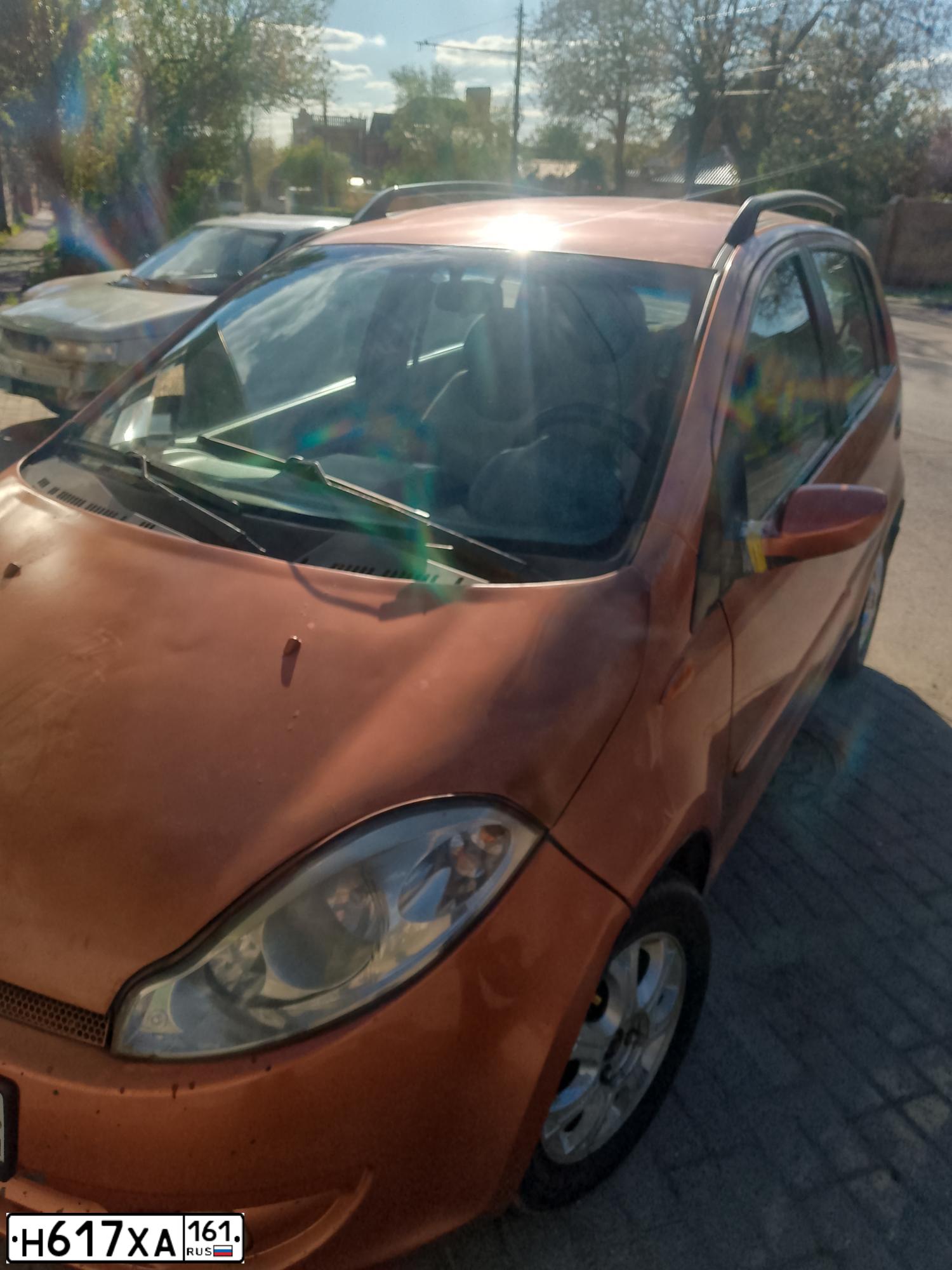 Фото автомобиля CHERY KIMO /A1/, 2008 — госномер Н617ХА161. Цвет: Оранжевый