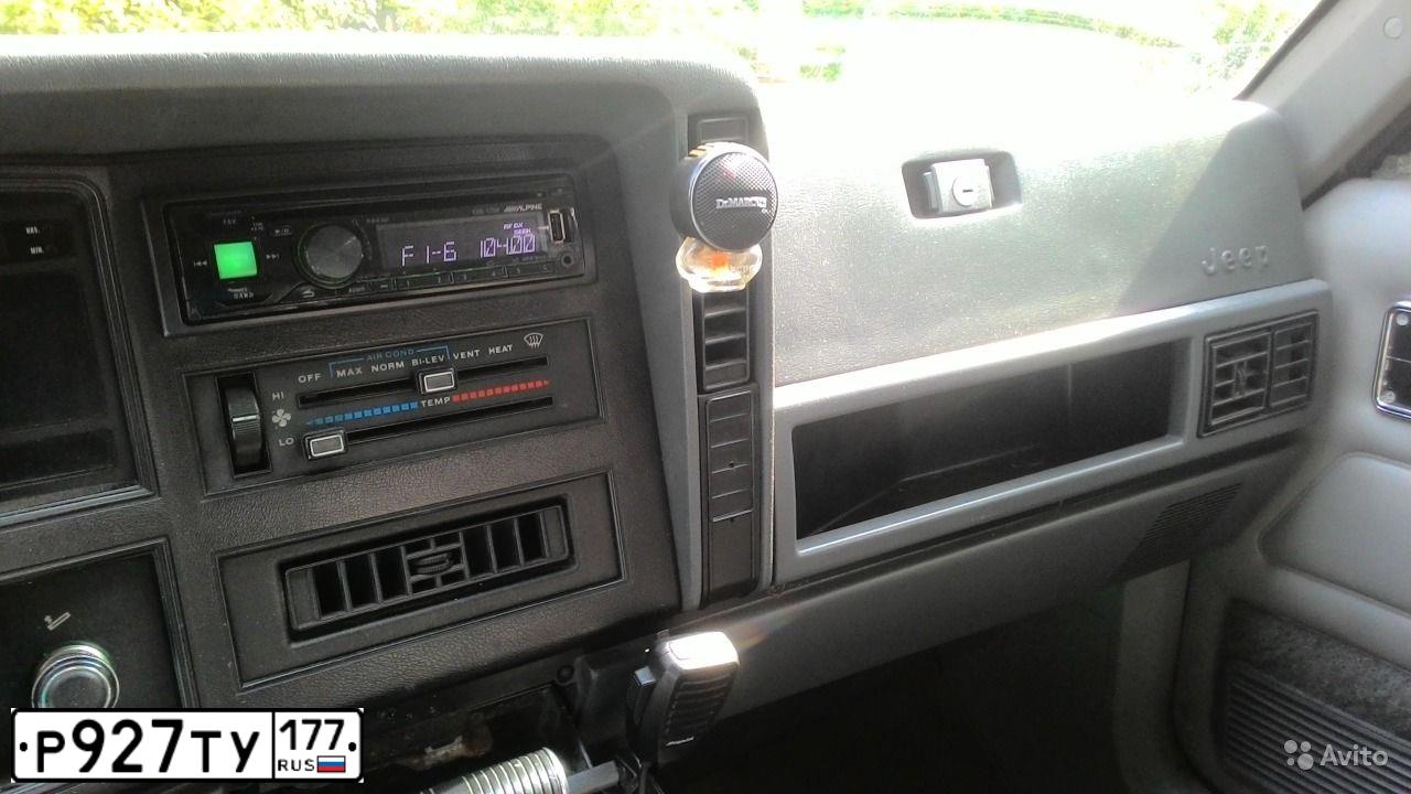 Фото автомобиля JEEP GRAND CHEROKEE, 1990 — госномер О353ТК31. Цвет: КОРИЧНЕВЫЙ