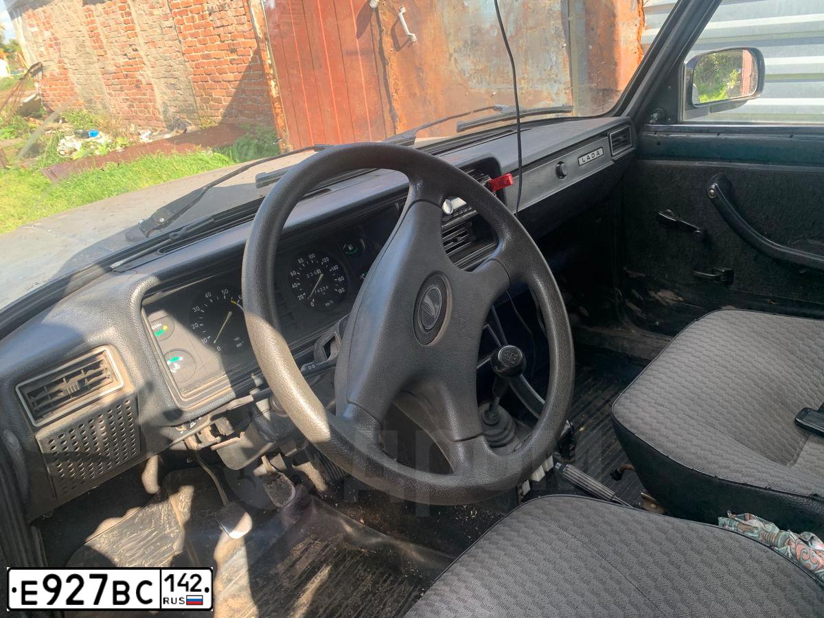 Фото автомобиля LADA 2107, 2005 — госномер Е927ВС142. Цвет: СИНЕ ЗЕЛЕНЫЙ