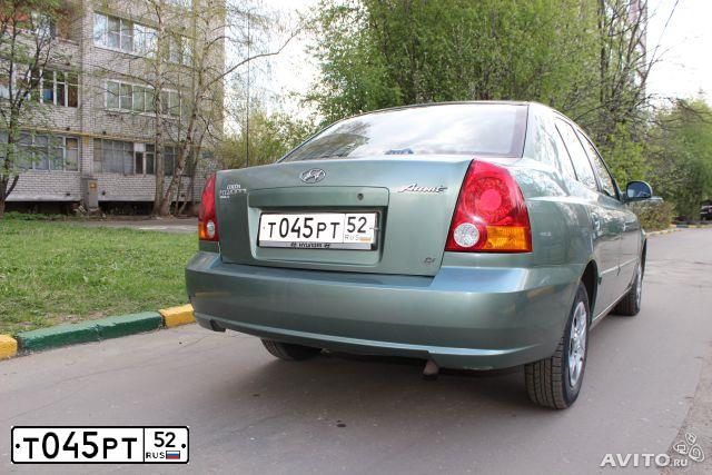 Фото автомобиля HYUNDAI ACCENT, 2002 — госномер Т045РТ52. Цвет: СЕРО-ЗЕЛЕНЫЙ