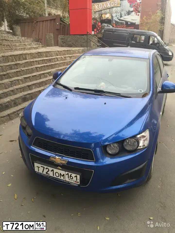 Фото автомобиля CHEVROLET AVEO, 2012 — госномер Т498НЕ31. Цвет: синий