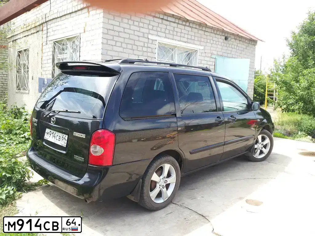 Фото автомобиля MAZDA MPV, 2002 — госномер М749ОМ750. Цвет: ЧЕРНЫЙ