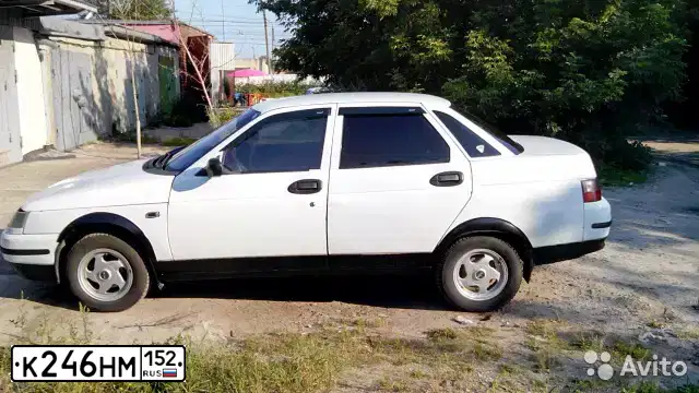 Фото автомобиля LADA 2110, 2000 — госномер К246НМ152. Цвет: ЯРКО-БЕЛЫЙ
