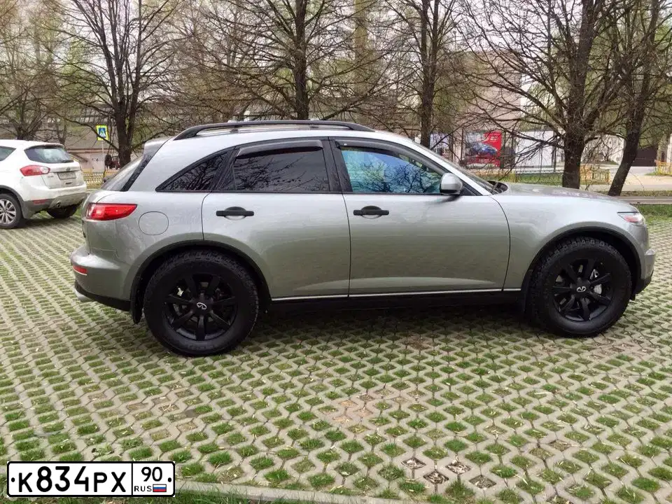 Фото автомобиля JEEP GRAND CHEROKEE, 1993 — госномер Т997СР77. Цвет: ЗЕЛЕНЫЙ