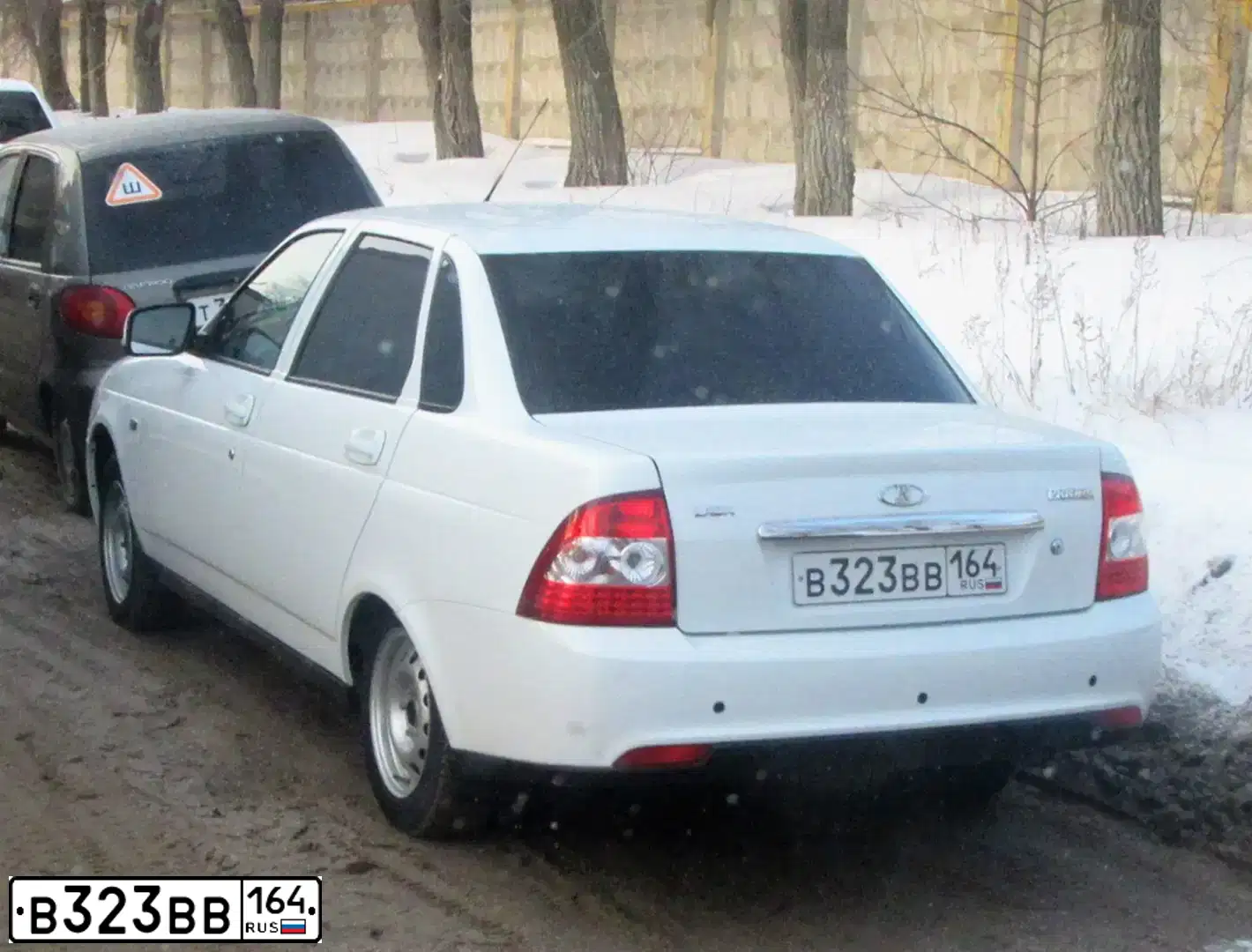 Фото автомобиля LADA 2113 SAMARA, 2010 — госномер В323ВВ164. Цвет: БЕЛЫЙ