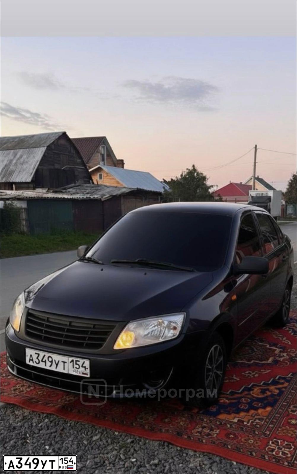 Фото автомобиля LADA 2190 GRANTA, 2012 — госномер А349УТ154. Цвет: СЕРО СИНИЙ
