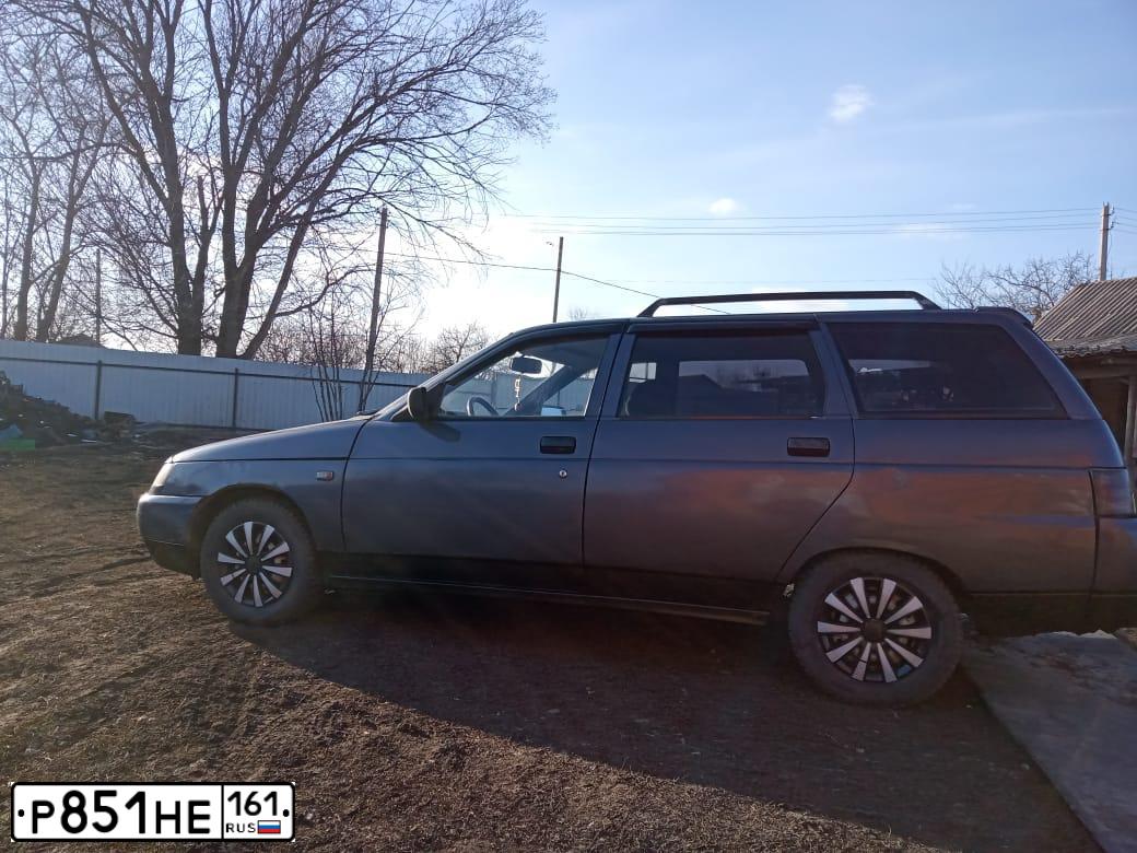 Фото автомобиля LADA 2111, 2001 — госномер С182НР30. Цвет: СЕРЕБРИСТЫЙ ТЕМНО-ФИОЛЕТОВЫЙ