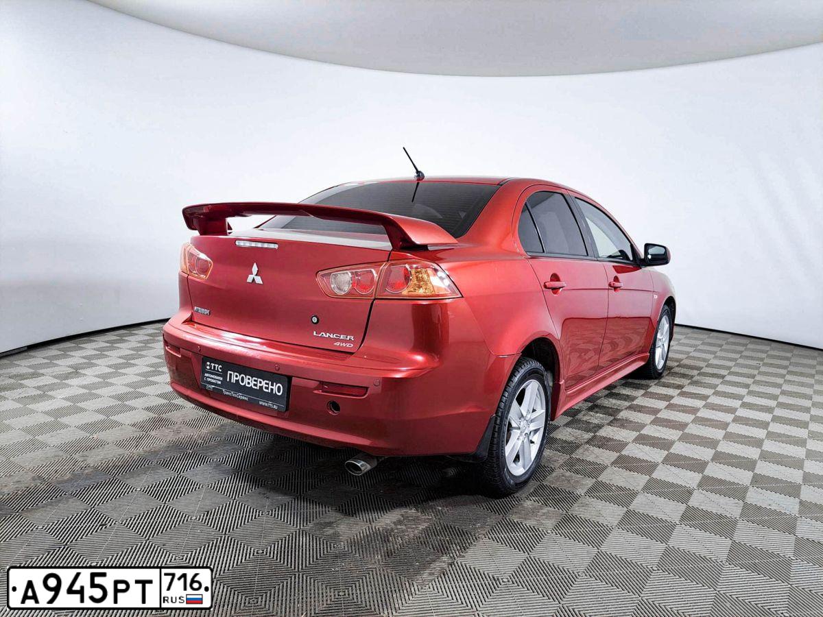 Фото автомобиля MITSUBISHI LANCER, 2008 — госномер М838МК702. Цвет: Красный