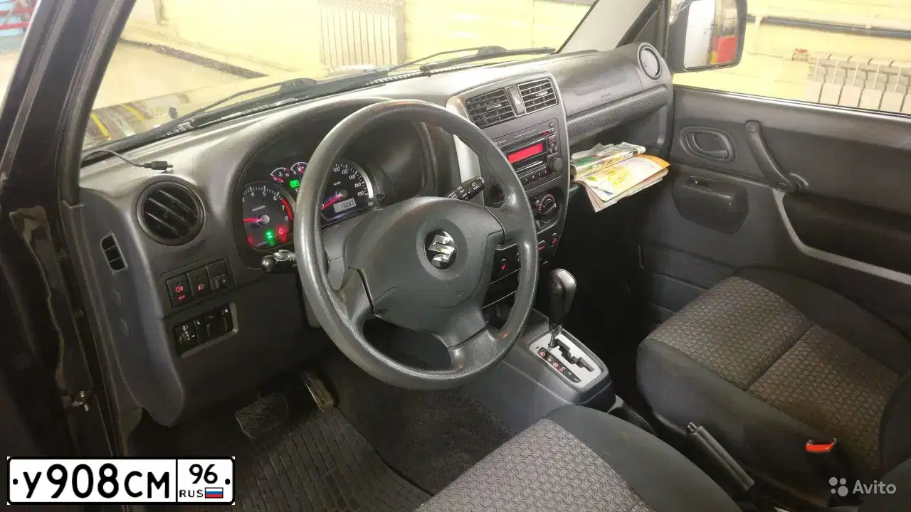 Фото автомобиля SUZUKI JIMNY, 2011 — госномер Р844ТМ11. Цвет: ЧЕРНЫЙ