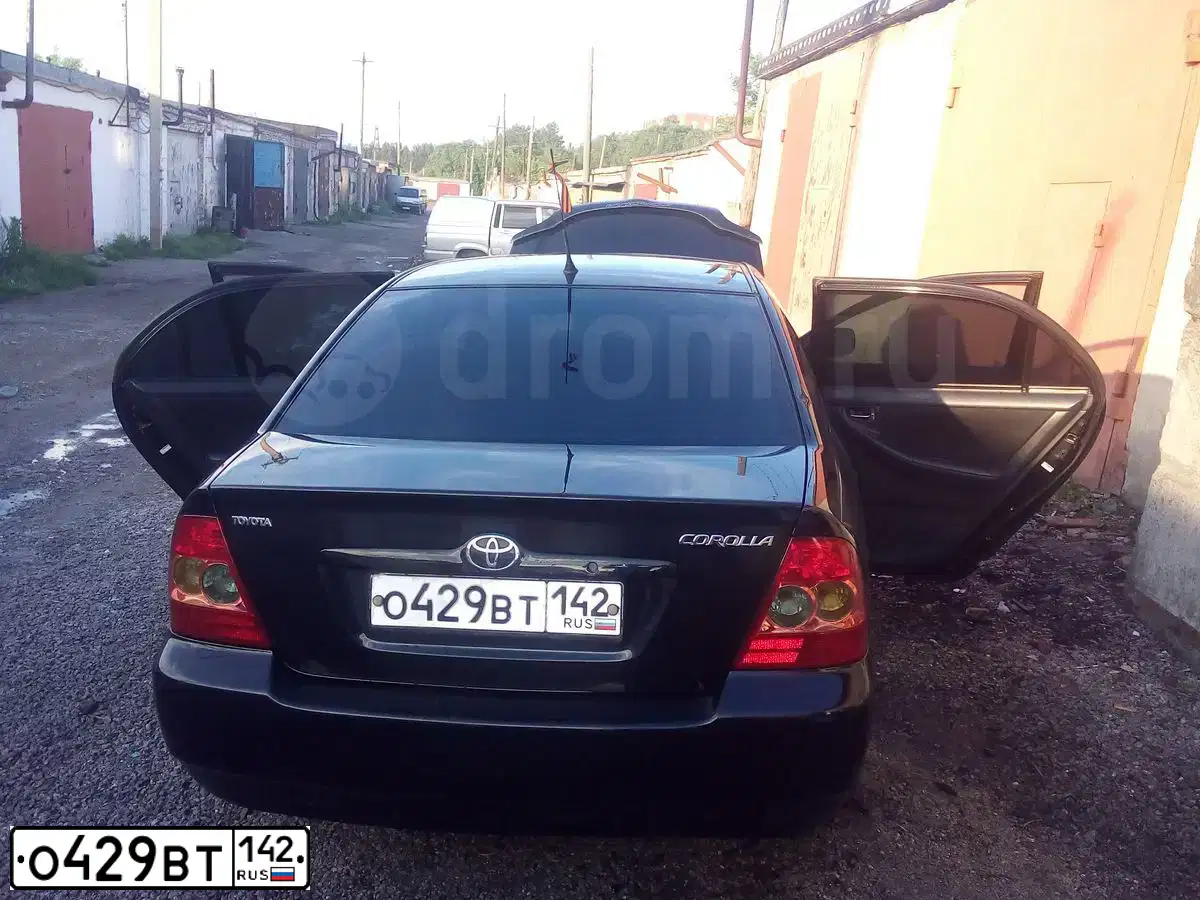Фото автомобиля TOYOTA COROLLA, 2005 — госномер О429ВТ142. Цвет: ЧЕРНЫЙ