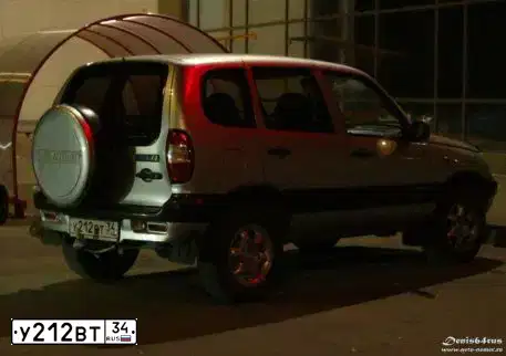 Фото автомобиля CHEVROLET NIVA, 2004 — госномер В034ХА134. Цвет: Серебристый