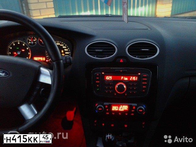 Фото автомобиля FORD FOCUS, 2007 — госномер Т714РТ72. Цвет: Серебристый